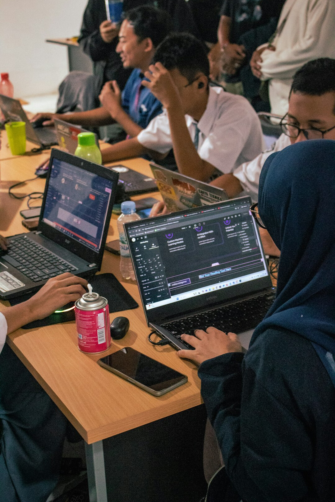 group of students learning coding