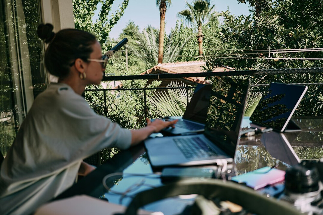 woman working on code at home