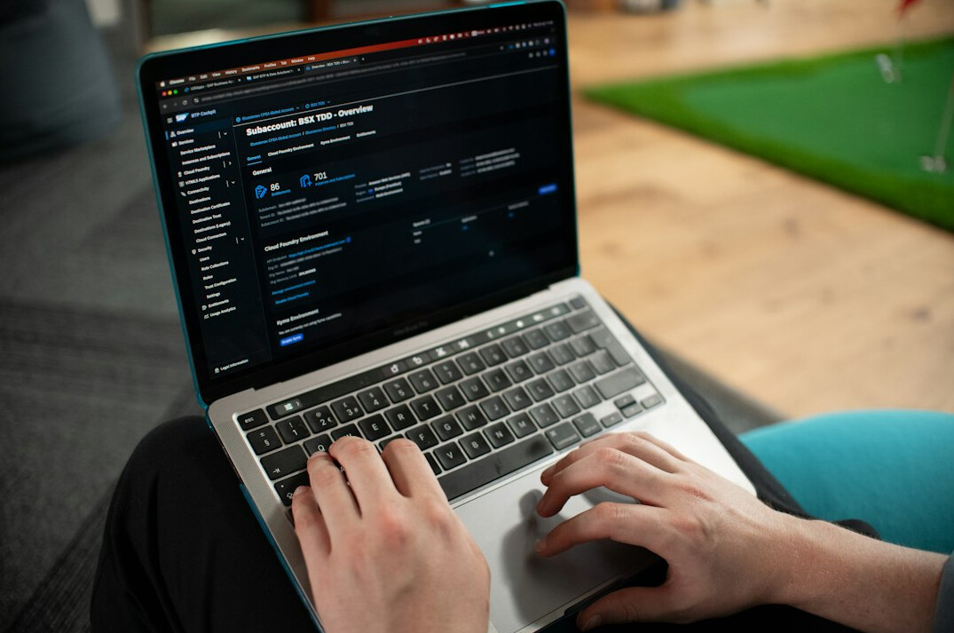 person learning programming on laptop