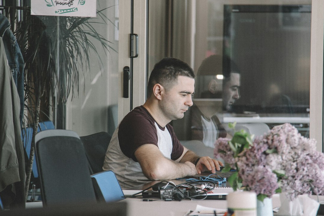 young coder at desk