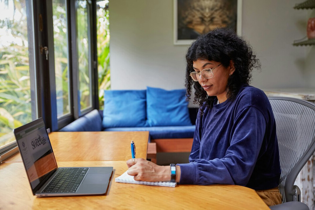 woman coding at home